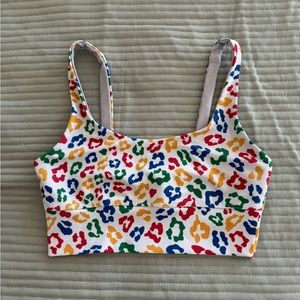BEACH RIOT Leah Sports Bra in Primary Leopard